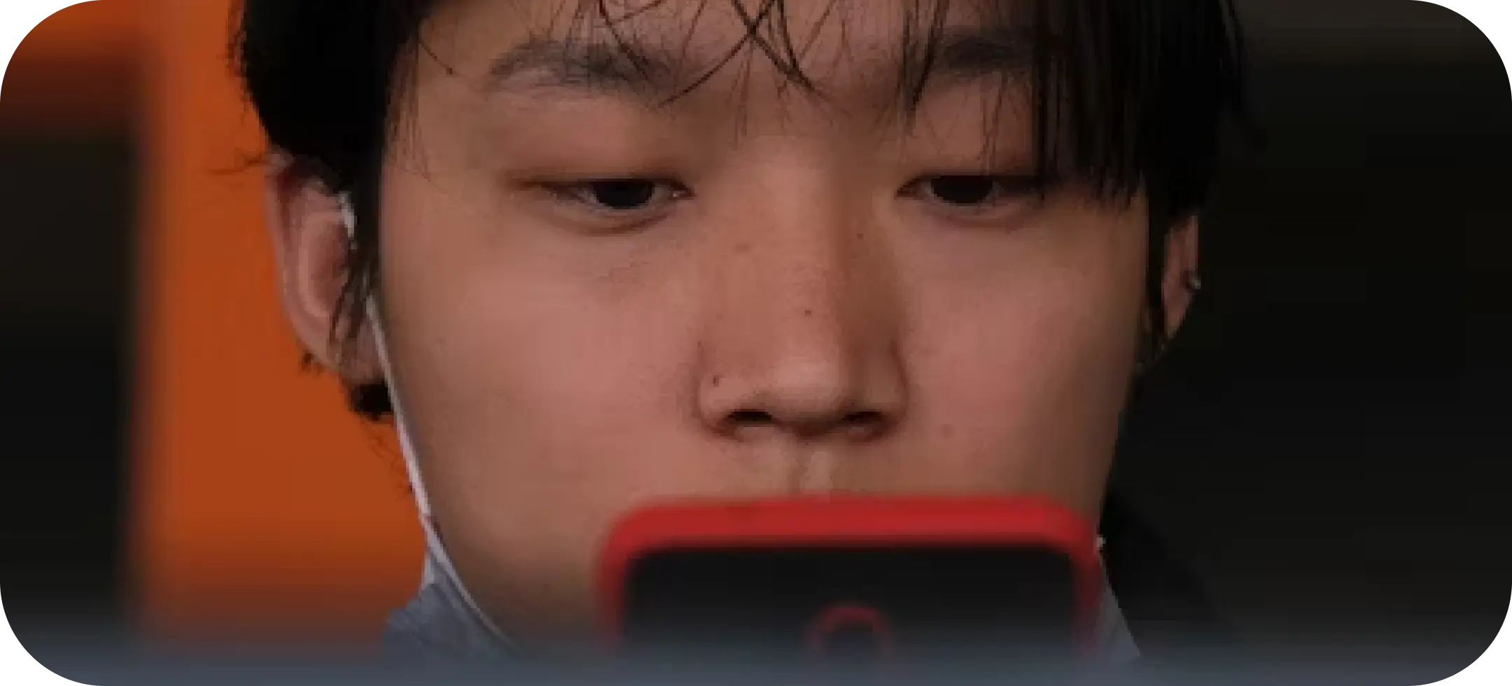 Photo of a man looking at his phone. Photo by Himanshu Choudhary